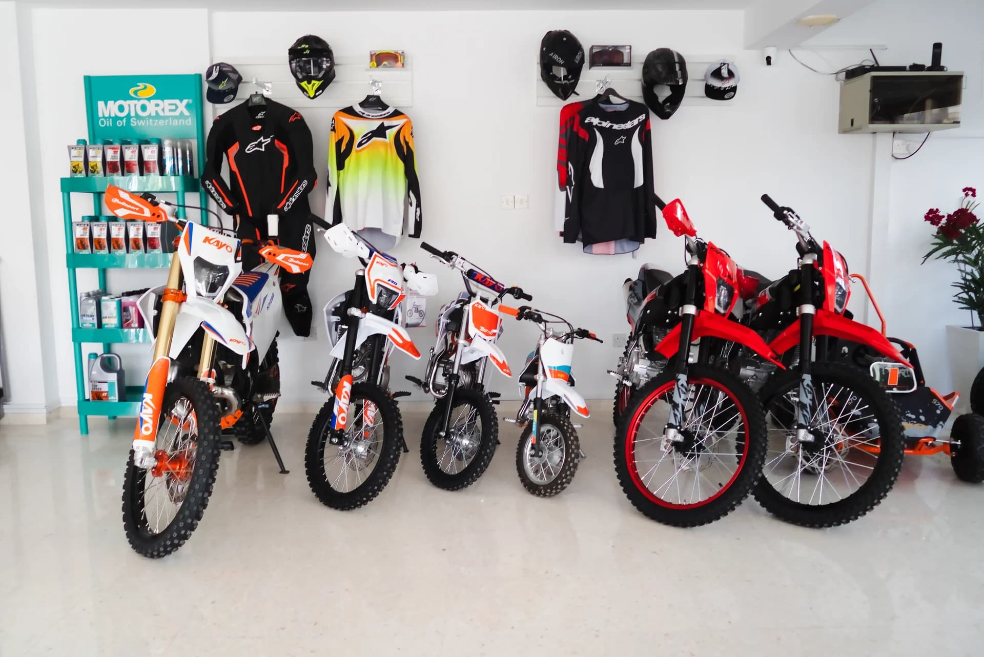 Kayo motorcycles lined up inside the new Paphos showroom